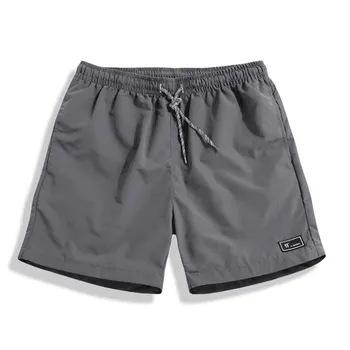 Мужские короткие брюки Летние пляжные брюки Быстросохнущие мужские спортивные Пятиточечные панталоны Cortos Большого размера Bermudas Masculina